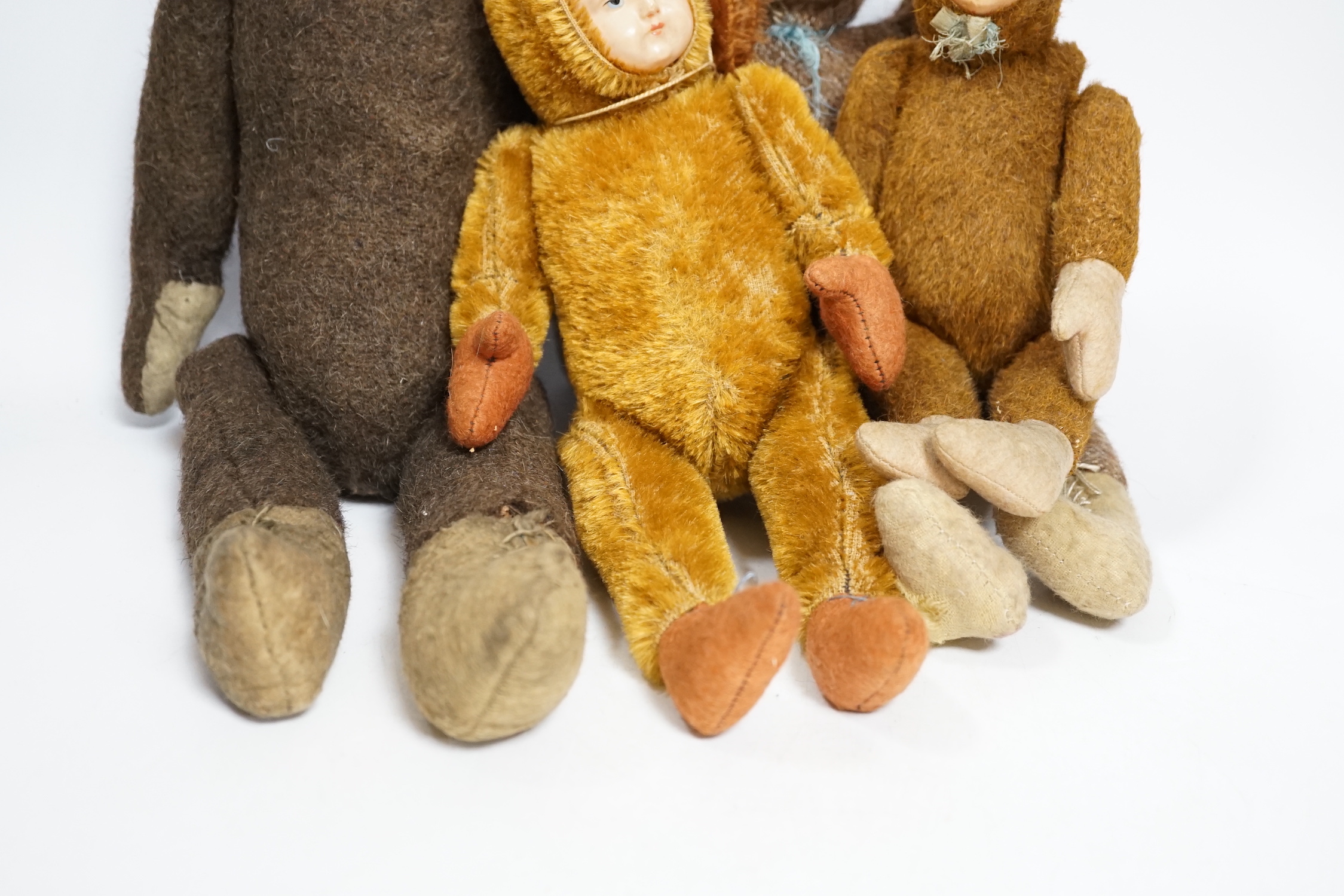 Four Teddy dolls with celluloid faces, c.1990